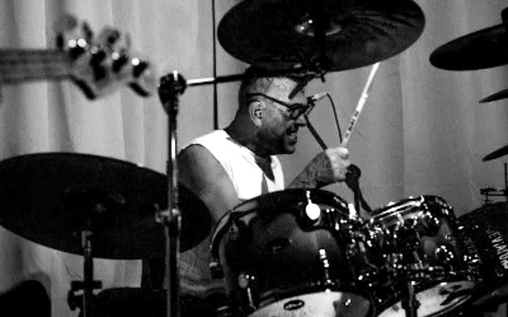 Drummer Andy performing behind his kit