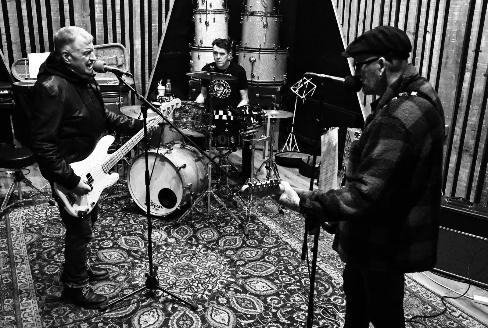 The Deviators in rehearsal: Bren on bass, Andy on drums, Bitzy on guitar